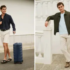 Mężczyzna w styl casual na wakacjach. Po lewej ciągnie walizkę, po prawej opiera się o balustradę.