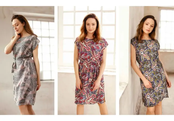 Trzy kobiety w sukienkach z wzorem paisley. Czy rayon oddycha? Tak, jest lekki i przewiewny, idealny na lato.